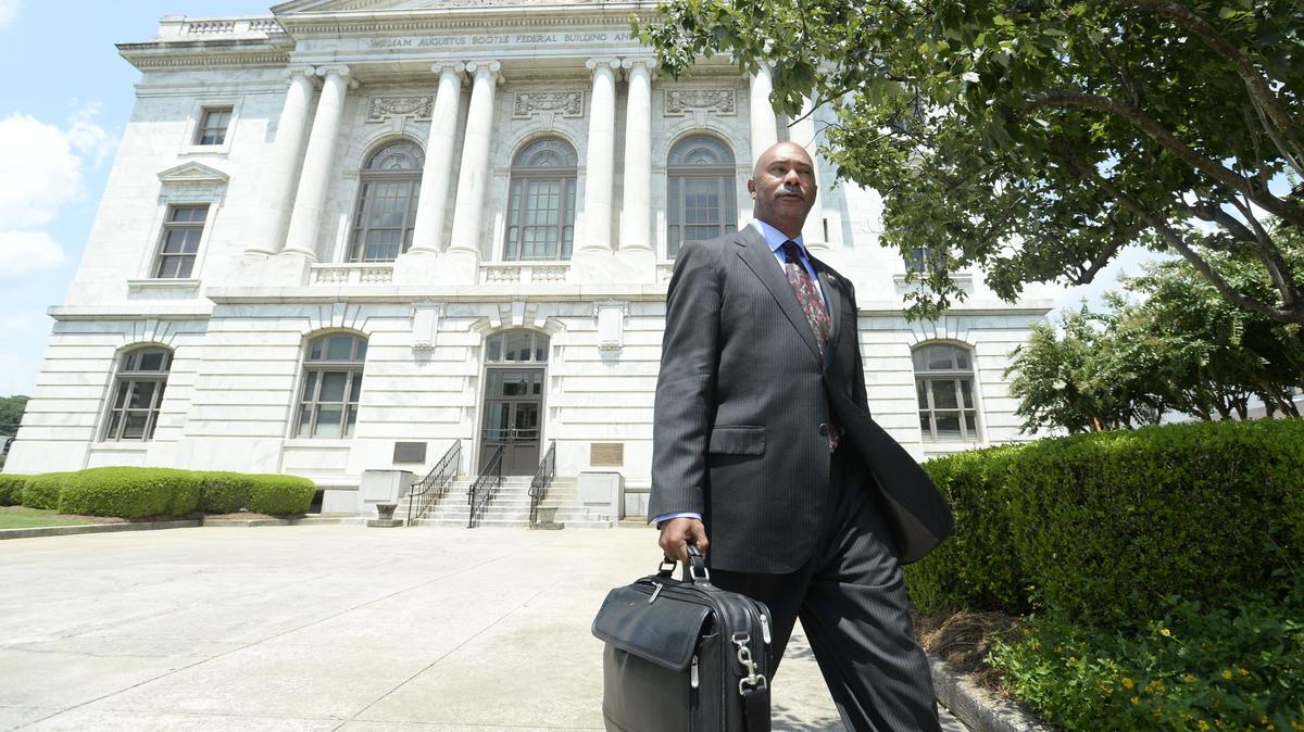 Isaac J. Culver III seen here earlier this year during his trial as he made his way from U.S. District Court, where he would be convicted of conspiracy to commit wire fraud, mail fraud and conspiracy to launder money as part of a $3.7 million deal in late 2012 to put new computers in Macon schools.