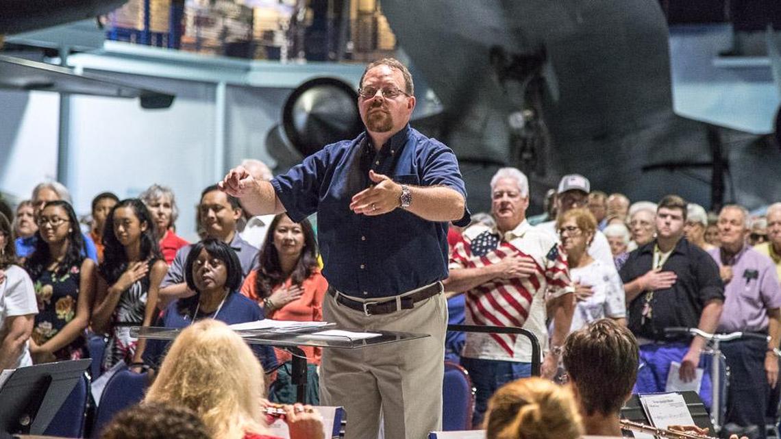 Conductor Lloyd McDonald directs the Wellston Winds. The band will bring Independence Day celebrations to life through patriotic music at a free concert at 3 p.m. Sunday at the Museum of Aviation.