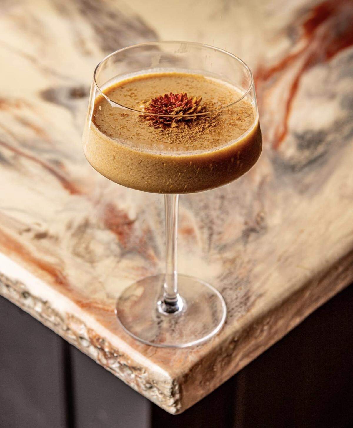 Her Majesty’s Cinderella Pumpkin Spice Martini is the most enchanting fall cocktail.
