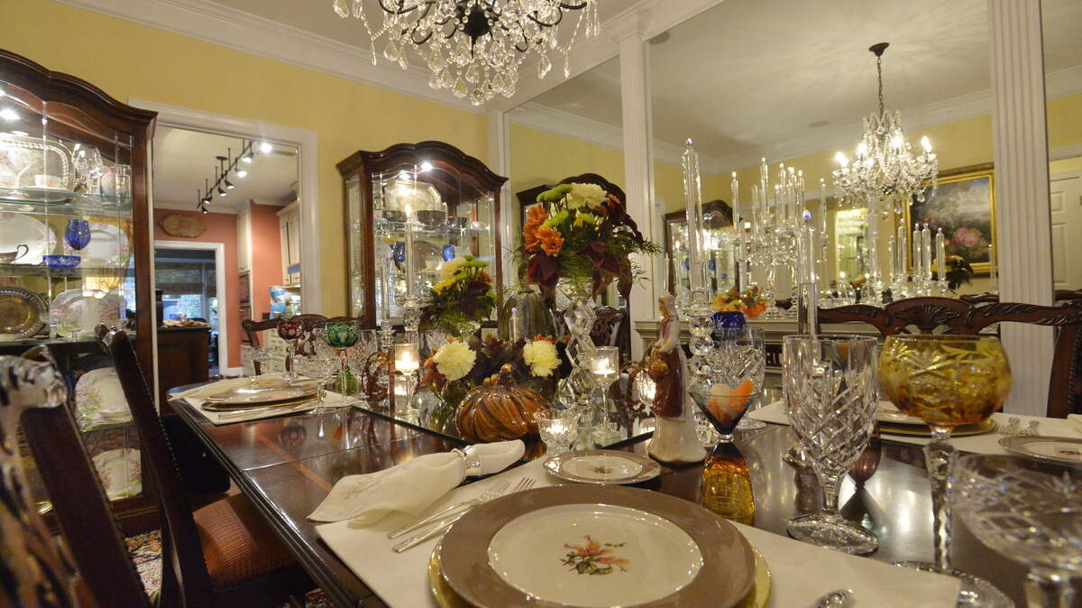 Phyllis Farmer's holiday table at her Macon home includes crystal, ceramics and flowers.