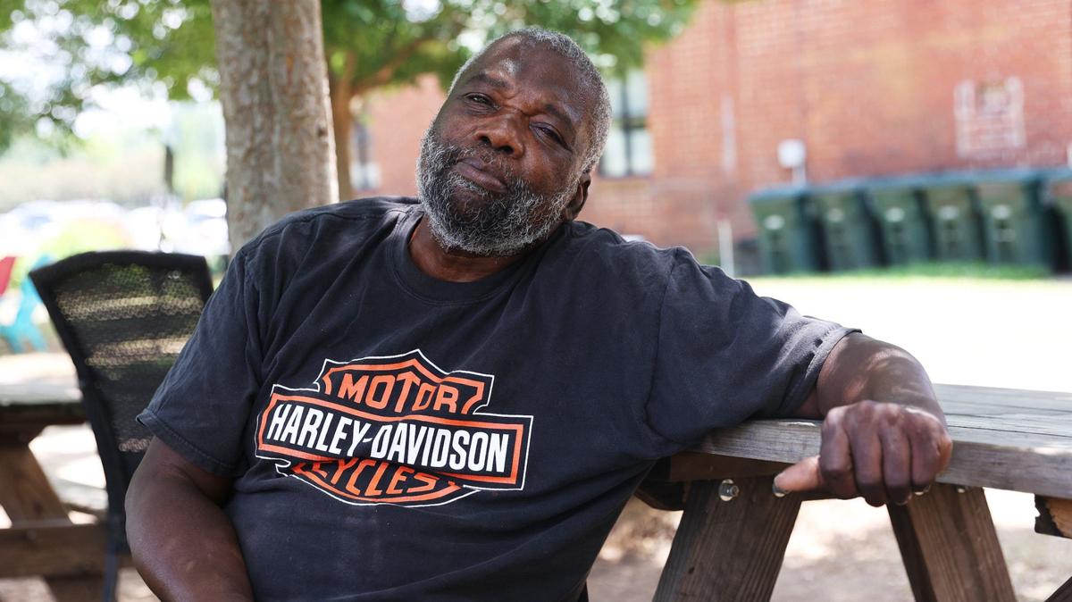 Arrell Bradley poses for a portrait in the courtyard outside of Daybreak on Friday, June 28, 2024, in Macon, Georgia. Bradley said that he has been homeless on and off for years and is using resources like Daybreak this summer to escape from local high temperatures.