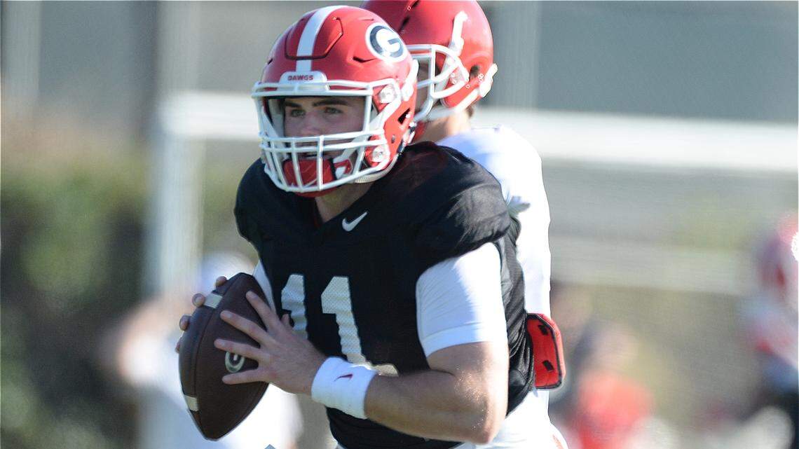 Georgia quarterback Jake Fromm takes a snap during Thursday's practice at the StubHub Center in Carson, California.