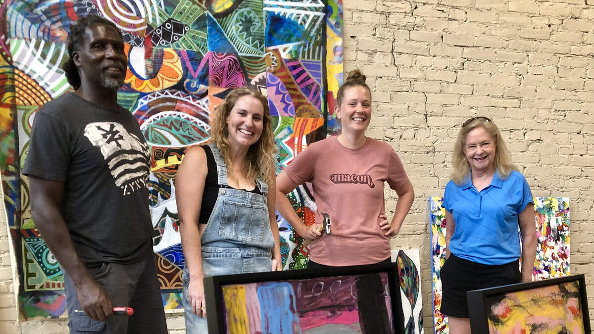 Rudy Mendes, Anna Richards, Erin Hawkins and Wimberly Treadwell discuss opening their art show at 830 High St. as part of today’s First Friday offerings. It’s the first show at the business-center-by-day location now showing local artists’ work on its historic walls.