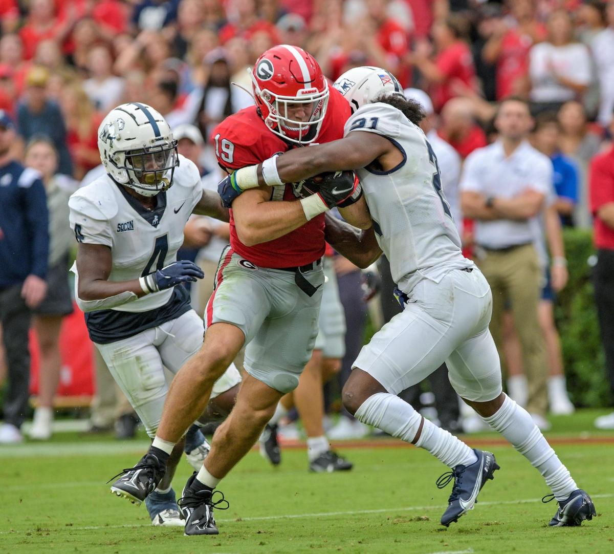 Georgia tight end Brock Bowers (19) gains a first down in the red zone Saturday during the Bulldogs’ game against Samford.