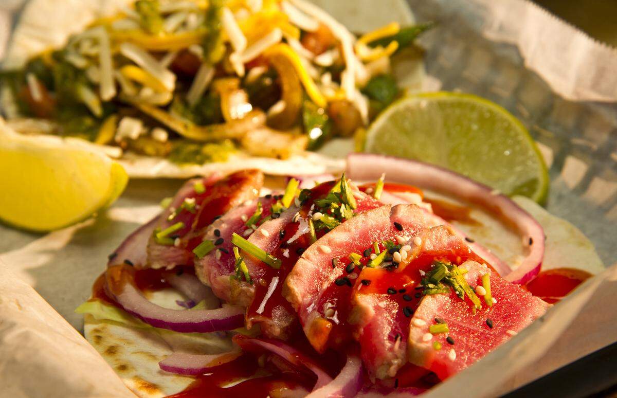 This popular gourmet taco shop in Warner Robins just south of Robins Air Force Base off Ga. 247 is opening as second location in Middle Georgia. Ahi tuna taco anyone (front)? The seared ahi tuna includes cabbage, pickled red onions, sesame seeds, cilantro and Asian BBQ. It’s called the 96. The Demon taco (back) has fajita-style steak with onions and peppers, mushrooms, cheddar jack cheese and chipotle aioli.