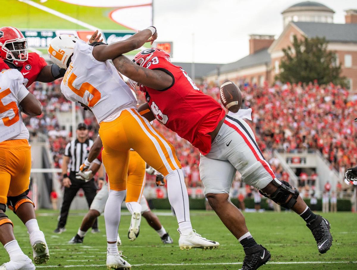 Georgia defensive lineman Jalen Carter hit Tennessee quarterback Hendon Hooker in first half action. The play was ruled an incomplete pass after review.