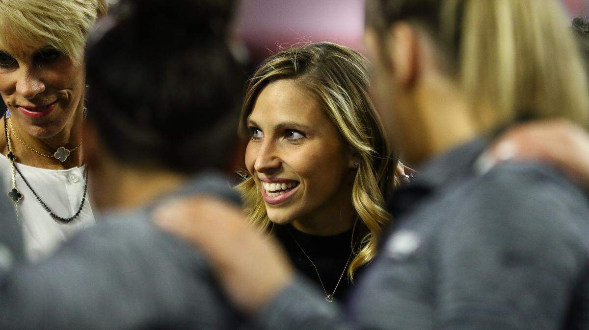 Georgia head coach Courtney Kupets Carter talks to her girls before the start of a gymnastics meet between the University of Georgia and Iowa State University in Stegeman Coliseum in Athens, Ga., on Monday, Jan. 21, 2019. (Photo by Kristin M. Bradshaw)