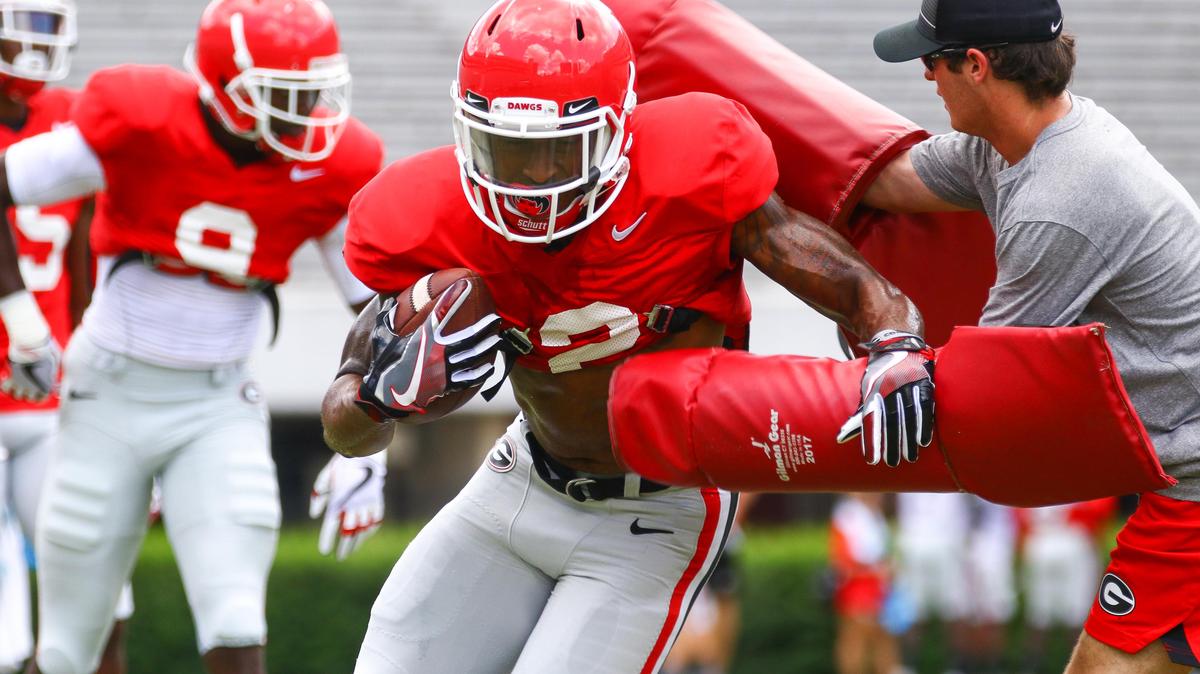 Georgia receiver Jayson Stanley (2) pushes through a drill at practice in Sanford Stadium in Athens on Aug. 11, 2018.