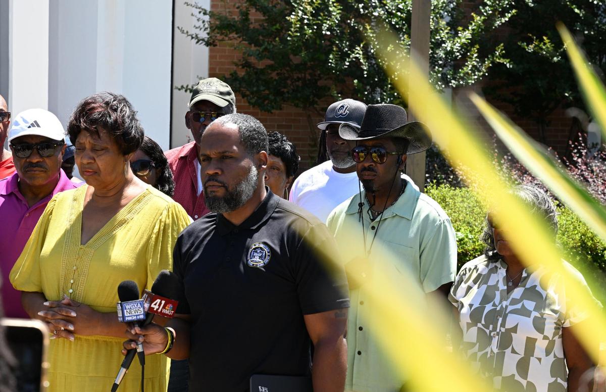 Georgia NAACP president Gerald Griggs (right) holds a press conference with Macon NAACP president Gwenette Westbrooks (left) and other community members before touring the Bibb County Jail on Wednesday, May 21, 2025, in Macon, Georgia. Griggs and Westbrooks met with Bibb County Sheriff David Davis on steps to improve jail conditions.