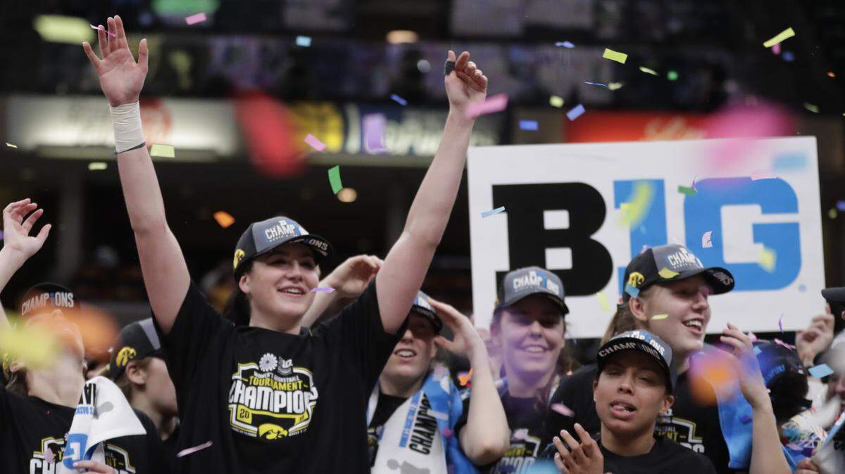 Iowa forward Megan Gustafson (10) celebrates following an NCAA college basketball championship game at the Big Ten Conference tournament against the Maryland in Indianapolis, Sunday, March 10, 2019. Iowa defeated Maryland 90-76. (AP Photo/Michael Conroy)