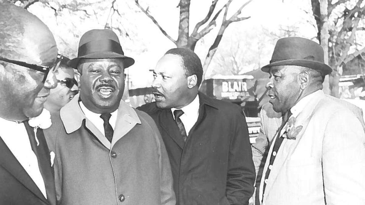 From left, William P. Randall, Ralph David Abernathy, Rev. Martin Luther King Jr. and an unidentified man during King’s visit to Macon on March 23, 1968, to speak at New Zion Baptist Church. (File Photo)