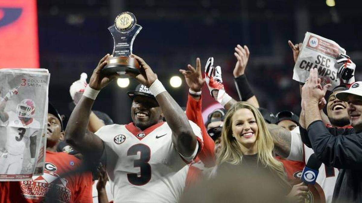 Georgia inside linebacker Roquan Smith celebrates with his team after the SEC Championship.