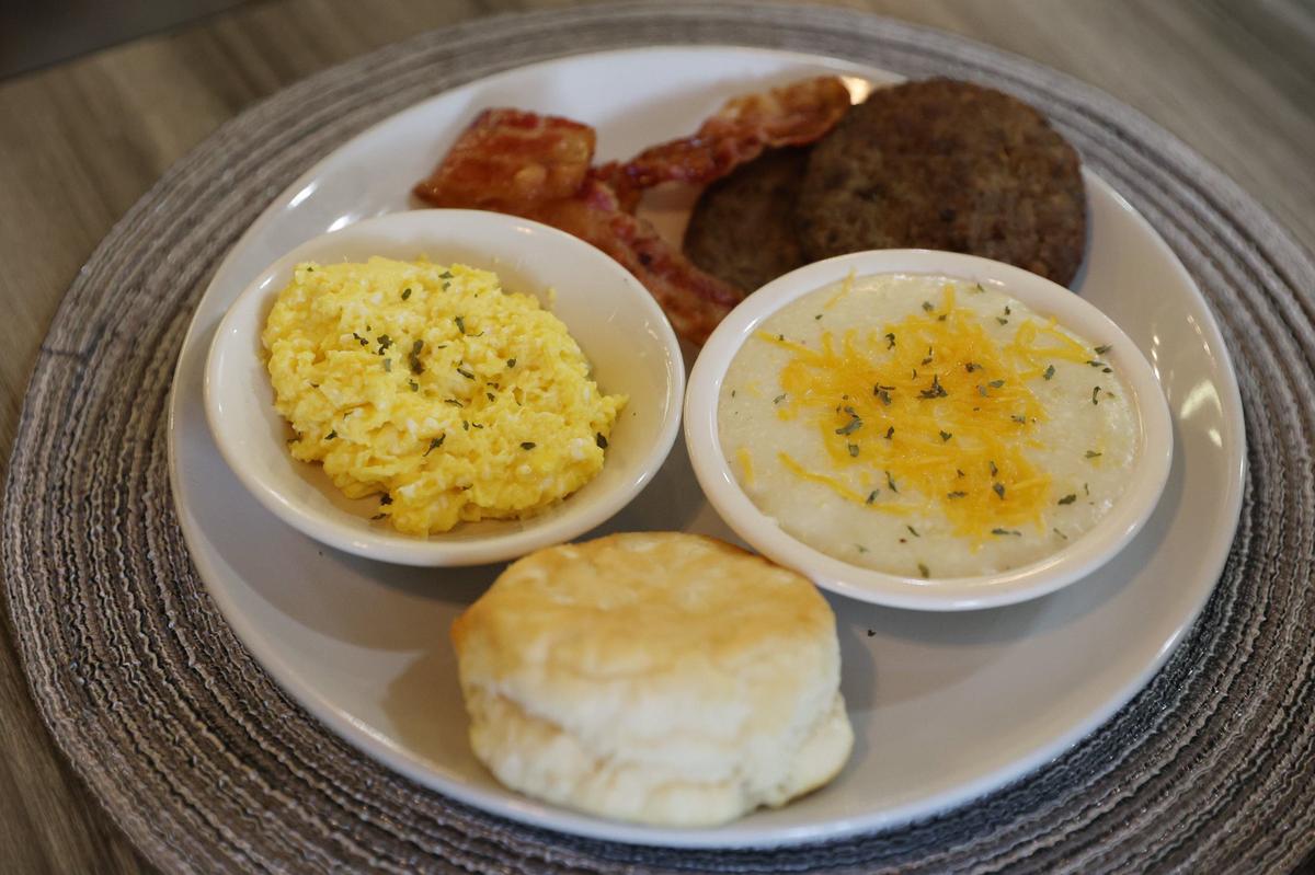 Breakfast food from 578 Southern Style Cuisine sits on a table in the restaurant on Friday, Oct. 4, 2024, in downtown Macon, Georgia. The new Macon soul food restaurant is open from early morning breakfast to late night dinner.