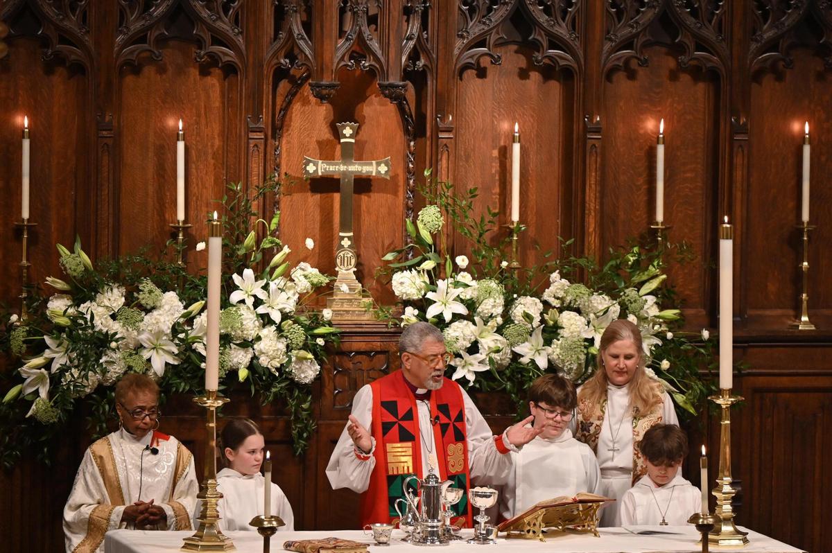 Archdeacon of Diocese Atlanta Janet Tidwell (far left), Bishop of Atlanta Rev. Robert Wright (middle) and Christ Church rector Rev. Cynthia C. Knapp celebrate holy communion during the bicentennial service at Christ Church on Thursday, Feb. 27, 2025, in Macon, Georgia. The communion vessels used in the service were held in a box in one of the church’s walls and were used at the church’s centennial service in 1925, but have not been touched since 1931.