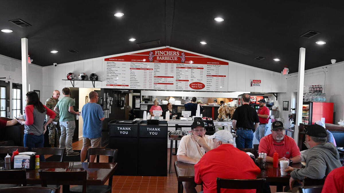 Customers on opening day of the new Fincher’s Barbecue location on Friday, May 15, 2026, in Warner Robins, Georgia. The new location is off South Armed Forced Boulevard across the street from Robins Air Force Base.