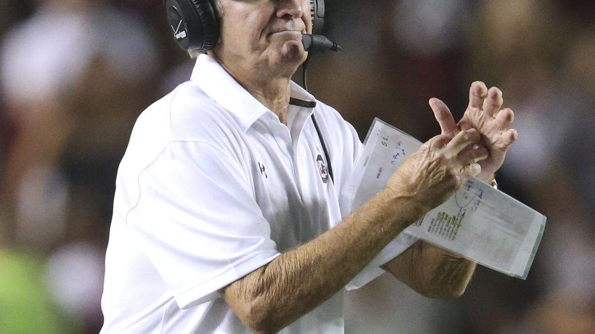 South Carolina head coach Steve Spurrier calls for a timeout in the second half of an NCAA college football game against Kentucky, Saturday, Sept. 12, 2015, in Columbia, S.C. Kentucky won 26-22. (AP Photo/John Bazemore)