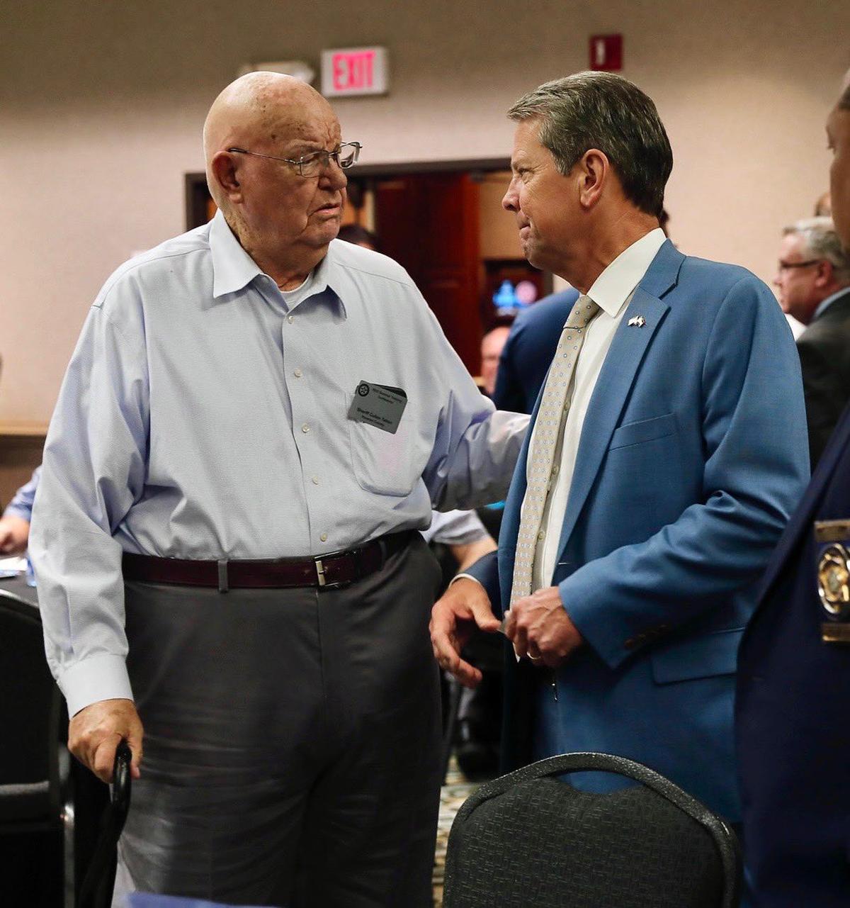 The late Cullen Talton, left, pictured alongside Gov. Brian Kemp. Talton served more than 50 years as Houston County’s sheriff.