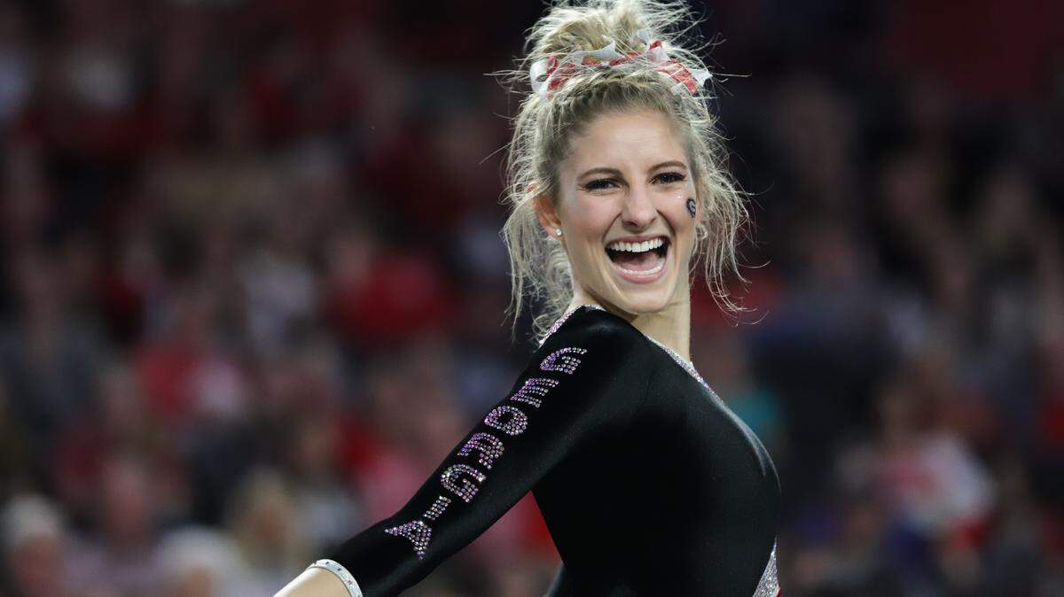 Georgia’s Sydney Snead smiles at the judges during her floor routine during a gymnastics meet between the University of Georgia and the University of Arkansas in Stegeman Coliseum in Athens, Ga., on Friday, Feb. 1, 2019. (Photo by Lauren Tolbert)