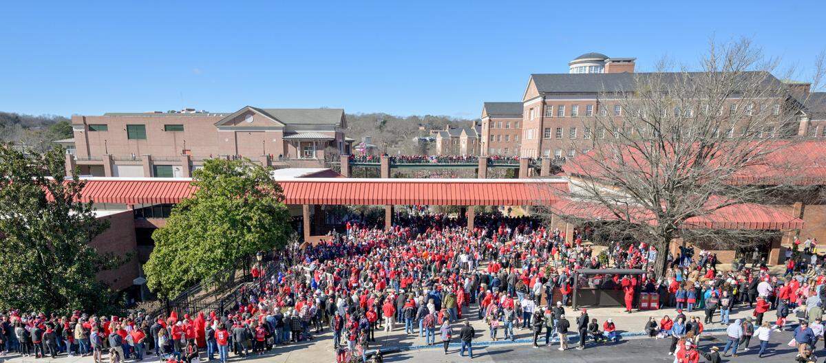 Georgia fans gather outside Sanford Stadium in Athens Saturday during the Bulldogs’ National Championship celebration.