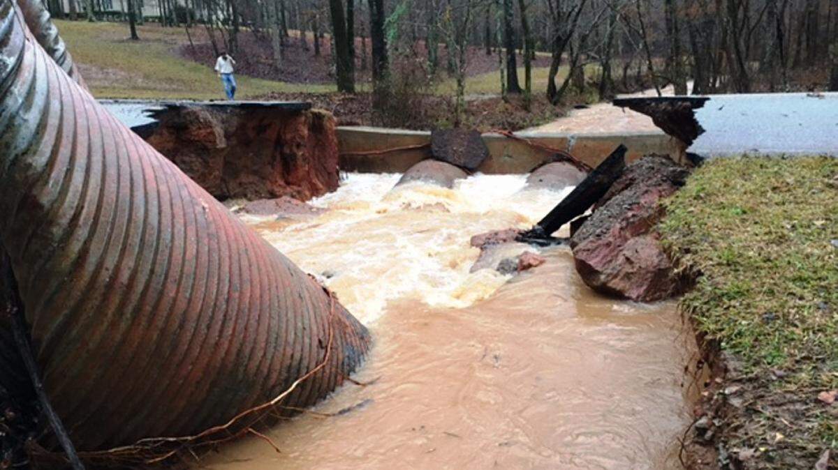 Putnam County Sheriff Howard Sills said that a large section of Rose Creek Road off the Gray Highway south of Eatonton was washed away by heavy overnight rains.