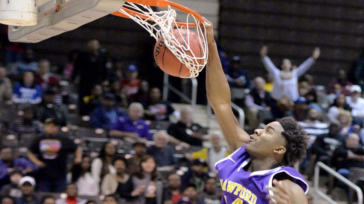 Crawford County's Alex Henton (44) dunks the ball in the final seconds of their GHSA AA quarterfinal win over Holy Innocents Episcopal Friday.