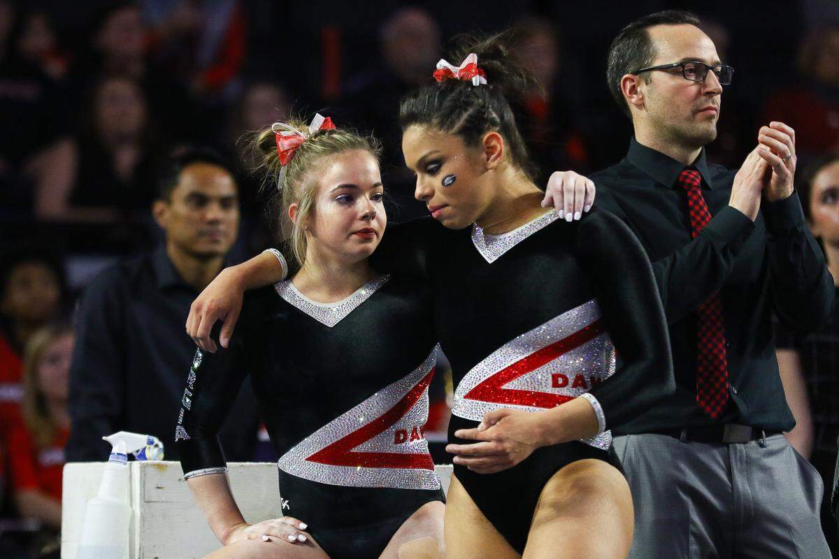 Georgia’s Marissa Oakley chats with Georgia’s Sabrina Vega during a gymnastics meet between the University of Georgia and University of Arkansas in Stegeman Coliseum in Athens, Ga., on Friday, Feb. 1, 2019.