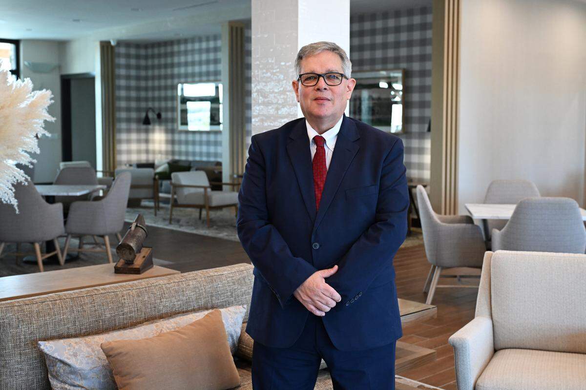 Hotel general manager Shawn Kosloff poses in the lobby of the Fairfield by Marriott Inn and Suites and TownePlace Suites by Marriott, a new dual branded hotel at the Georgia National Fairgrounds & Agricenter in Perry.