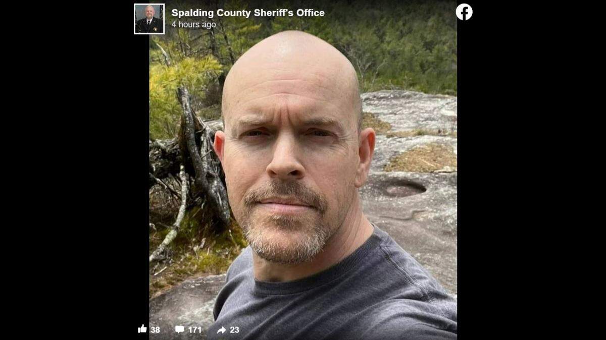 Jamie Reynolds, a deputy with Spalding County Sheriff’s Office in Georgia, died when a falling pine tree crushed his vehicle, officials said.
