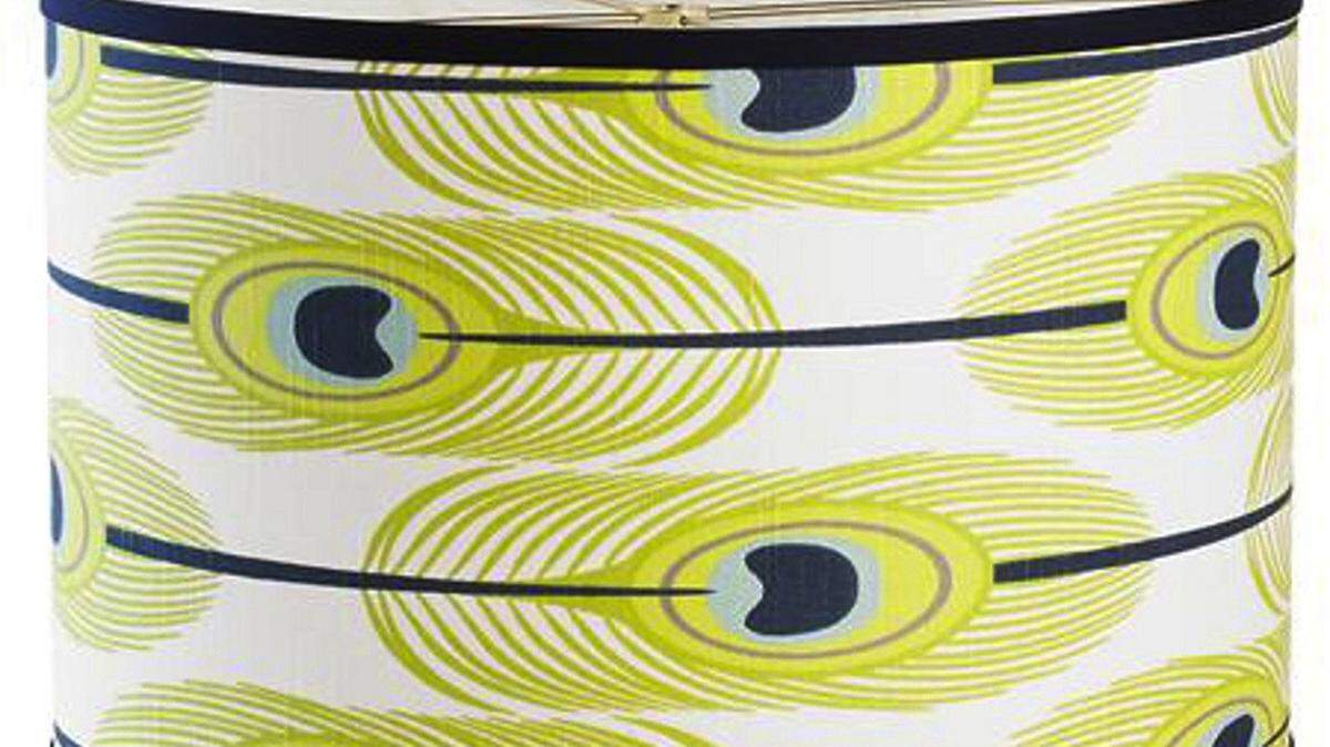Peacock feathers are a fetching graphic design on a 16-inch drum shade, $69 from Shades of Light (www.shadesoflight.com) (Shades of Light)