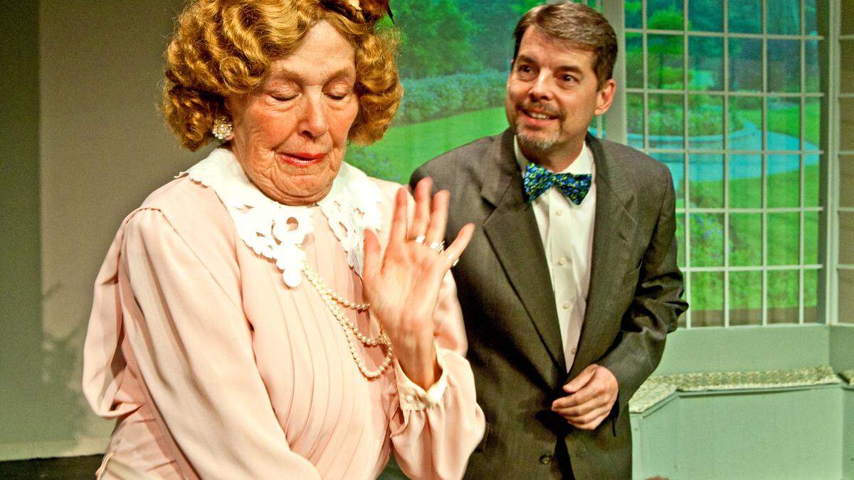 Jane Wilson, as Aunt Ellen, expresses shock after being introduced to Harvey the invisible rabbit by Elwood, played by Stuart Appleton, during rehearsal of a scene from the Perry Players' production of "Harvey."
