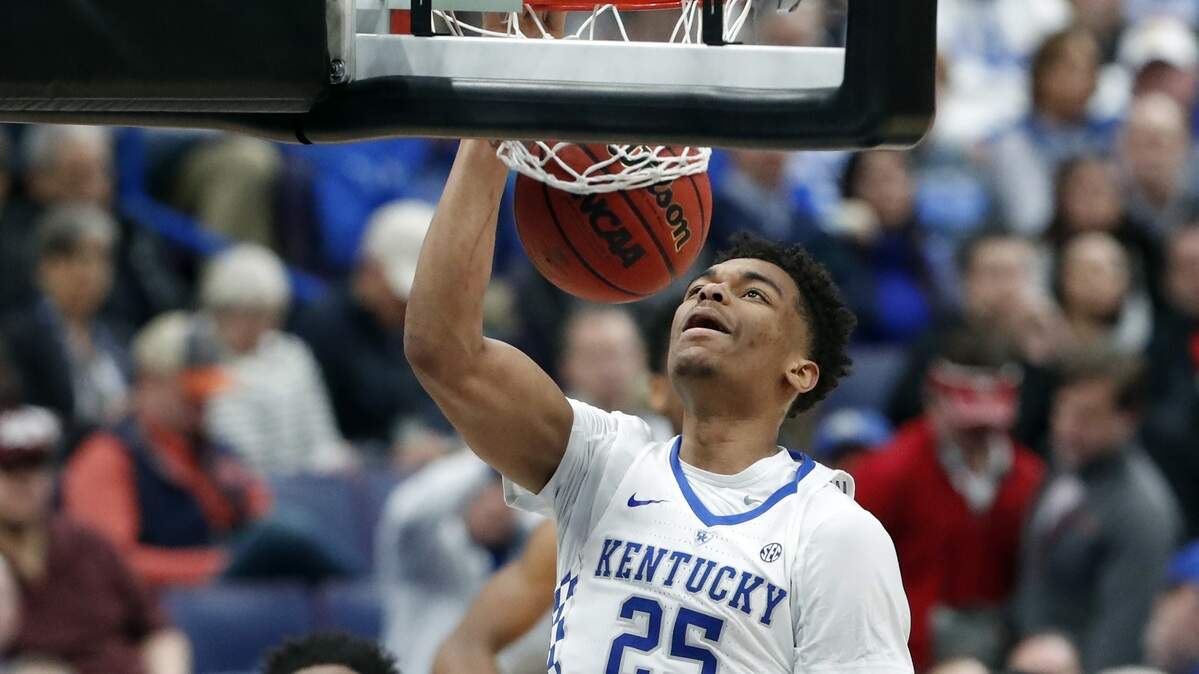 Kentucky's PJ Washington dunks the ball during Friday's SEC Tournament quarterfinal game against Georgia.