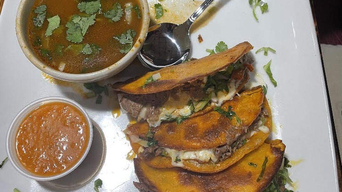 Quesabirrias at Medina’s Mexican Grill at 1281 South Houston Lake Road in Warner Robins. Quesabirrias consist of birria-style stewed meat folded into tortillas that have been soaked in the fat of the meat broth and served with a side of broth for dipping. The photo has been cropped.