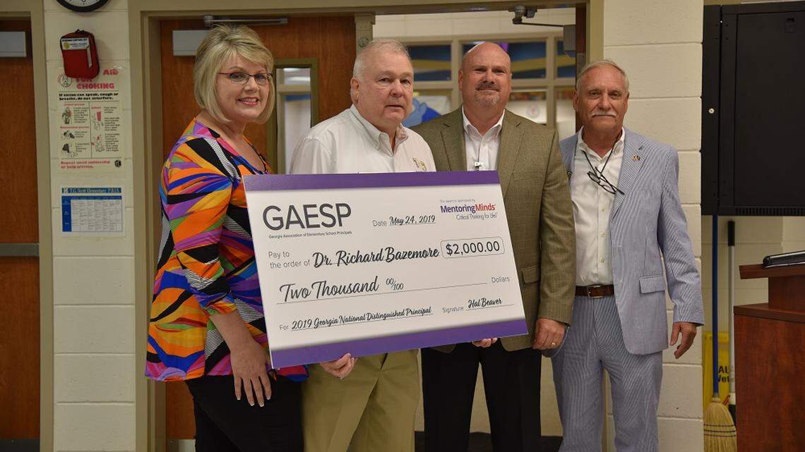 ‘I am very honored.’ A long career led this Forsyth principal to a national award