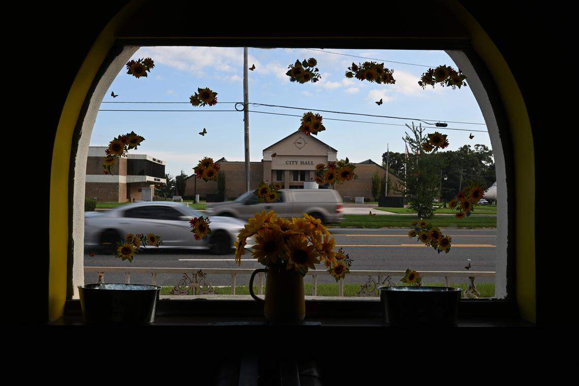 A look outside from a window inside Comfort Foods Kitchen and Grill off Watson Boulevard shows Warner Robins city hall across the street.