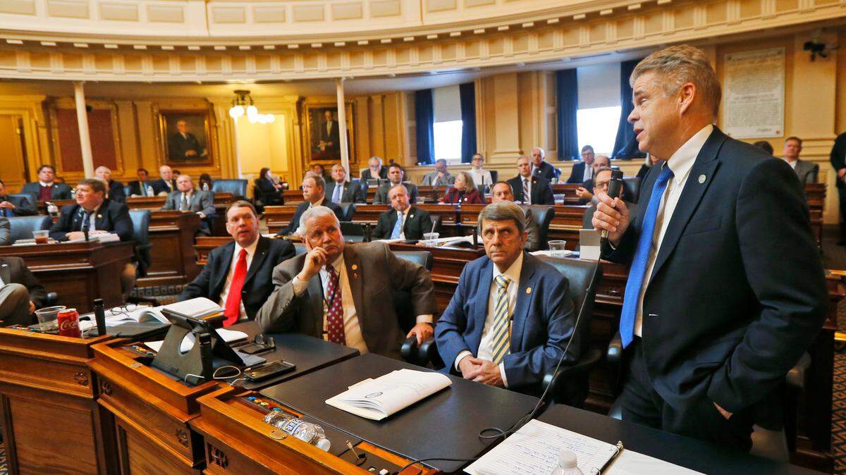 Virginia House Speaker Kirk Cox, a Republican, right, gestures as he delivers a speech from the floor of the House during session at the Capitol in Richmond, Va., on Wednesday. Cox spoke against a bill that would expand late term abortions.