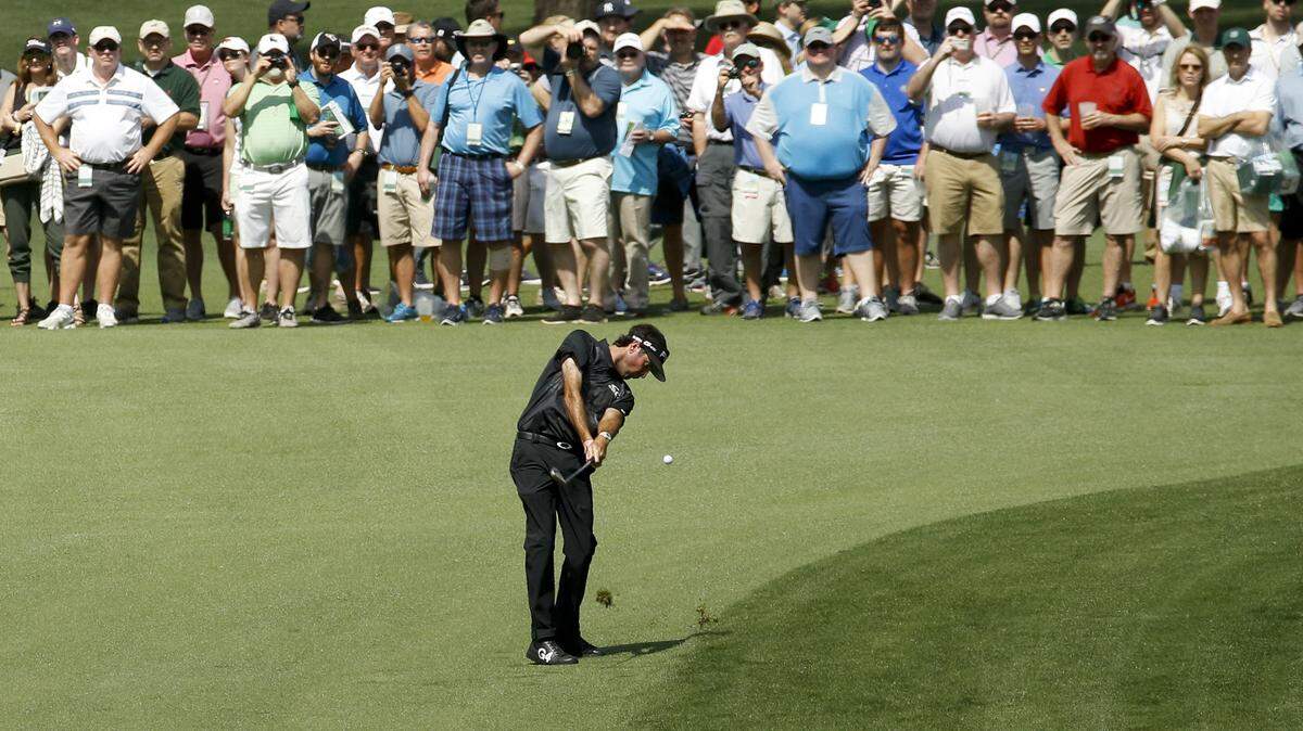 Bubba Watson hits from the seventh hole during a practice round at the Masters.