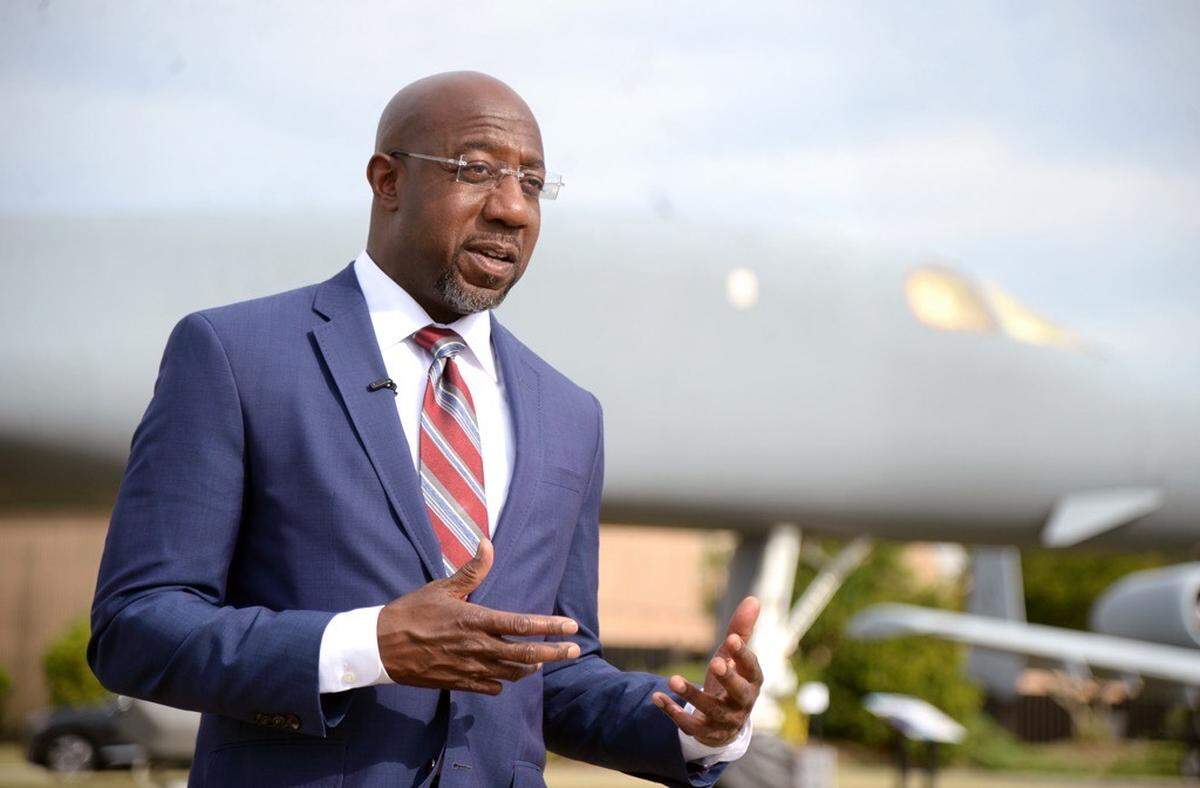 Senator Raphael Warnock, (D-GA), spoke with local media outside the Museum of Aviation after touring Robins Air Force Base June 2, 2021.