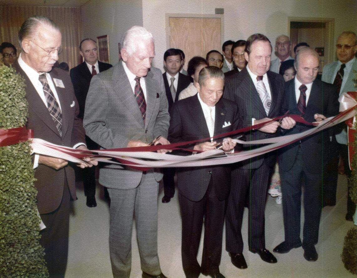 A grand opening and ribbon cutting is held for the YKK plant in Macon, Georgia.