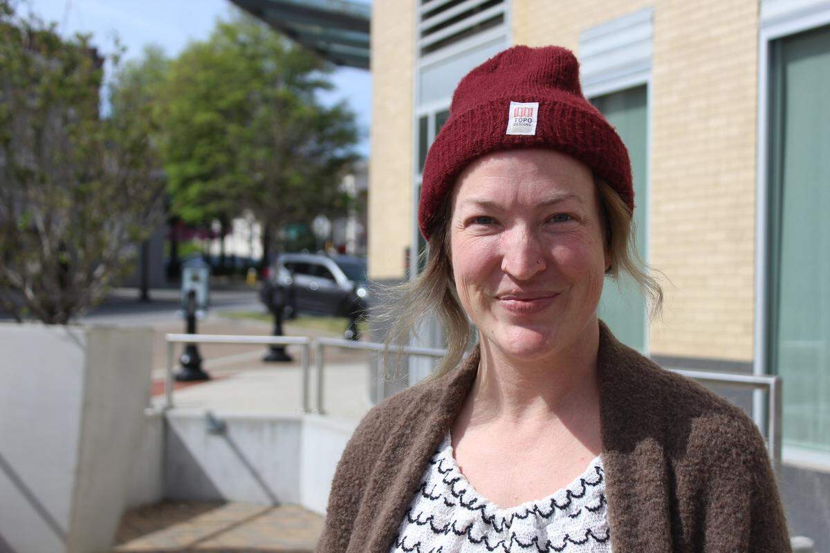 Heather Owens, owner of House Cocktails, smiles while discussing her new bar on Wednesday, March 18, 2026, in downtown Macon.