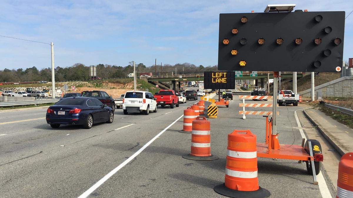 Cars follow a construction detour on Spring Street. The public is invited to comment until March 17 on pending transportation projects in Macon-Bibb and parts of Jones and Monroe counties.