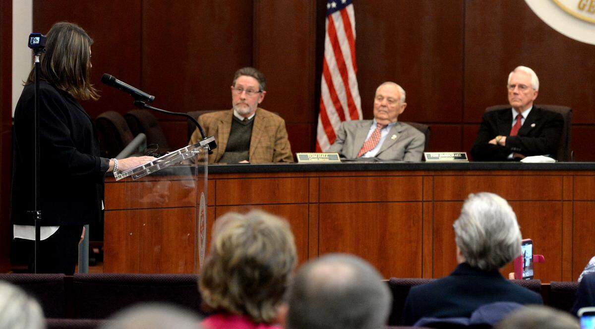 Sgt. Anna Lange, a Houston County Sheriff’s Office criminal investigator, asks officials at the Houston County Commission meeting on Feb. 19. Lange to add treatment for gender dysphoria to the county’s employee insurance coverage. County Attorney Tom Hall denied her request. Her lawyer plans to file a complaint with the Equal Employment Opportunity Commission.