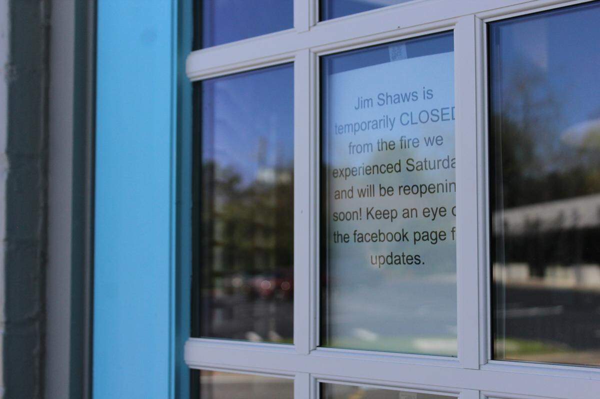A flyer posted on a window on Monday, March 17, 2025, at Jim Shaw’s Seafood Grill at 3040 Vineville Avenue in Macon, Ga. notified guests of a fire Saturday that temporarily closed the business.