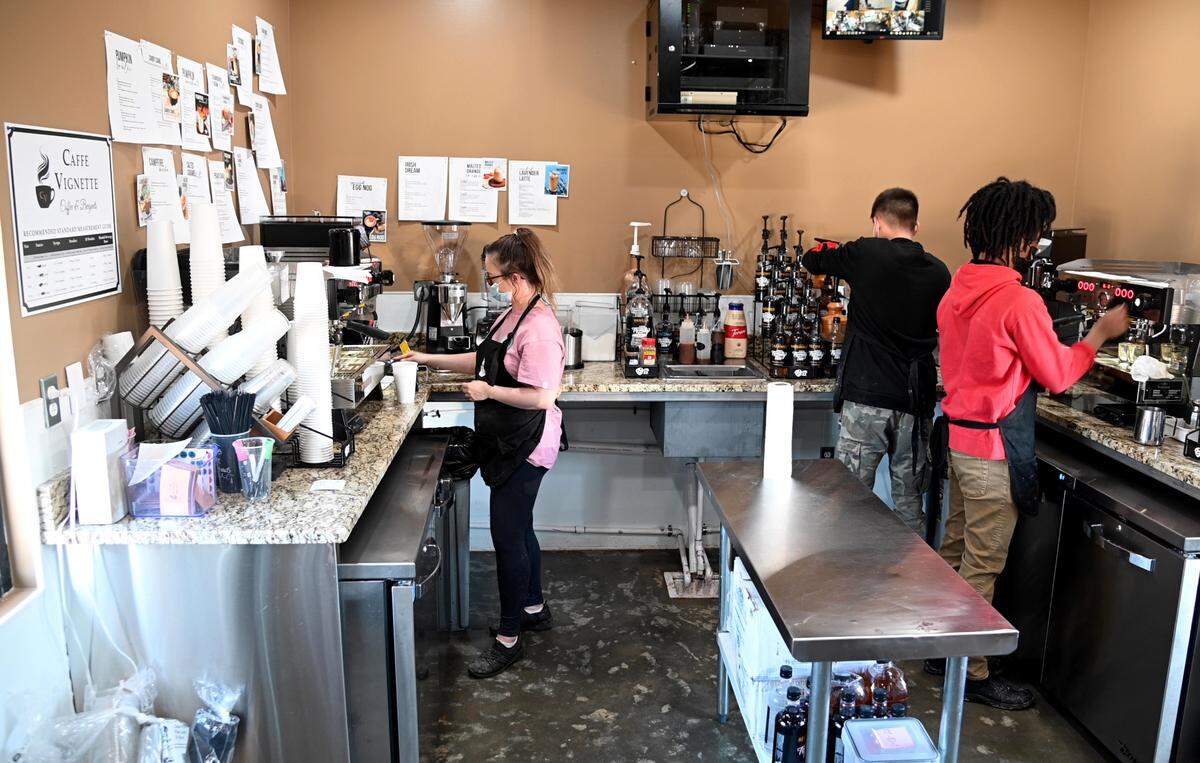 Baristas make drinks at Caffe Vignette located at 107 Assembly Lane in Warner Robins.