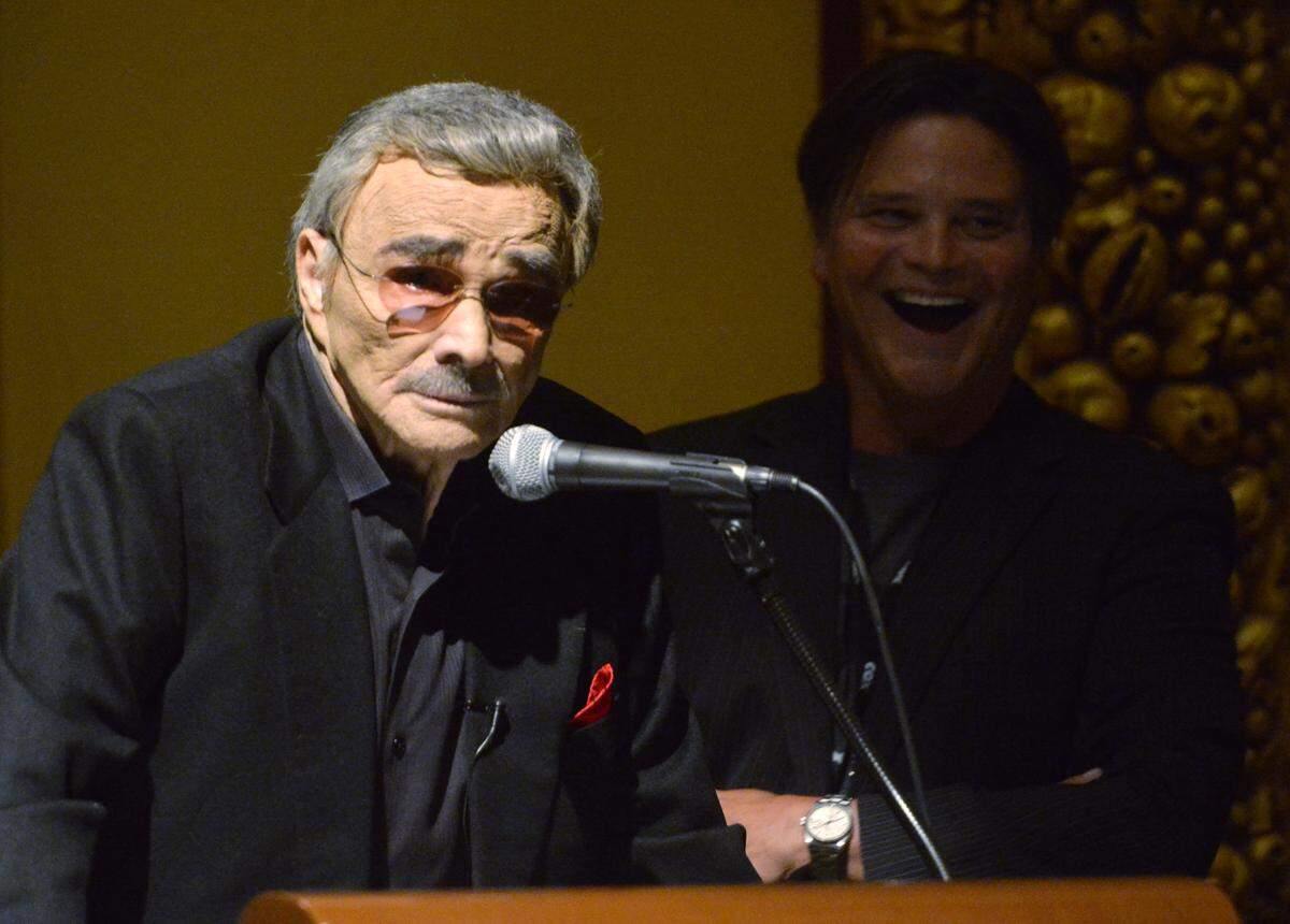 Burt Reynolds speaks before the showing of a 1972 film print of “Deliverance” at the Douglass Theatre as part of the 10th annual Macon Film Festival July 17, 2015.
