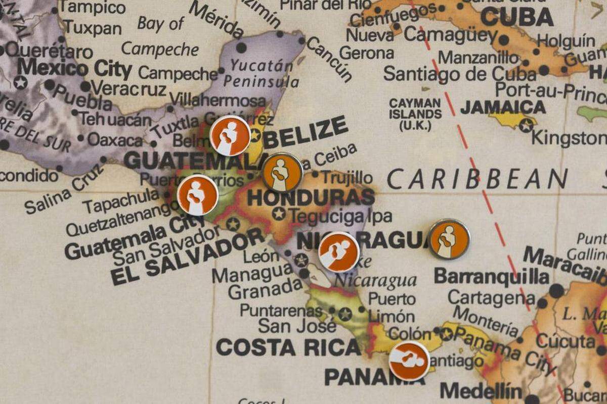 Pins line the length of Central America on the map of the world in the lobby of the Mana factory, showing where some of the nonprofit’s peanut-based nutrition for kids has been deployed in the past.