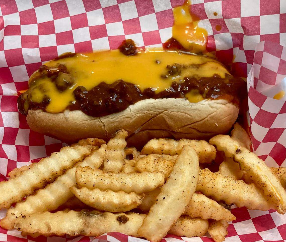 The Chili Cheese Dog with a side of french fries at The Georgia Dog, a walk-up restaurant inside the Houston County Galleria in Centerville.