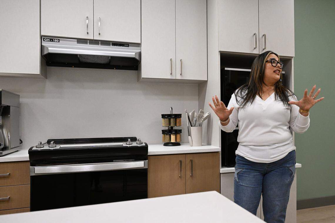 Intellectual and development disabilities (IDD) department day program coordinator Nancy Turner stands in the teaching kitchen while giving a tour through the IDD wing of the new River Edge Adult Peer Support and Community Integration Center on Tuesday, Jan. 27, 2026, in Macon, Georgia. River Edge’s IDD services were previously housed at a facility on Woodfield Drive in Macon.