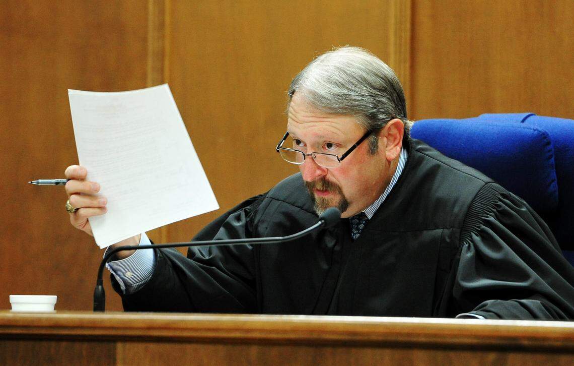 WOODY MARSHALL/THE TELEGRAPH Macon, Georgia, 10/15/2014: Judge Howard Simms addresses Jordan Maxwell, a member of the MOE who already has pleaded guilty to murder in Monroe County, plead guilty to his part in a gang crime spree in Bibb County that included multiple robberies.