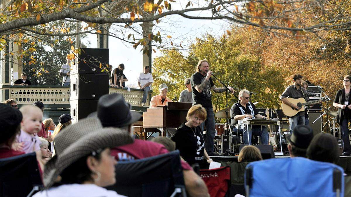 A band made up of veterans of the road and some young people plays "Midnight Rider" during a previous year's Skydog event at Central City Park in Macon.