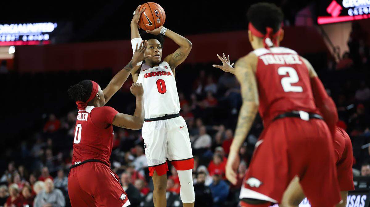 Georgia guard Taja Cole (0) takes a shot during a game between the University of Georgia and the University of Arkansas in Stegeman Coliseum in Athens, Ga., on Thursday, February 21, 2019.